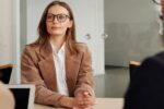 Professionals collaborating on business process documentation in an office