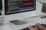 Person typing code during a technical interview preparation session