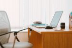 Clean modern office desk setup representing a fresher's first day at work