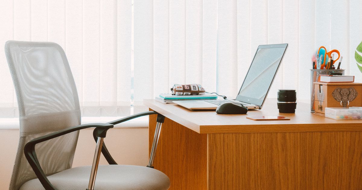 Clean modern office desk setup representing a fresher's first day at work