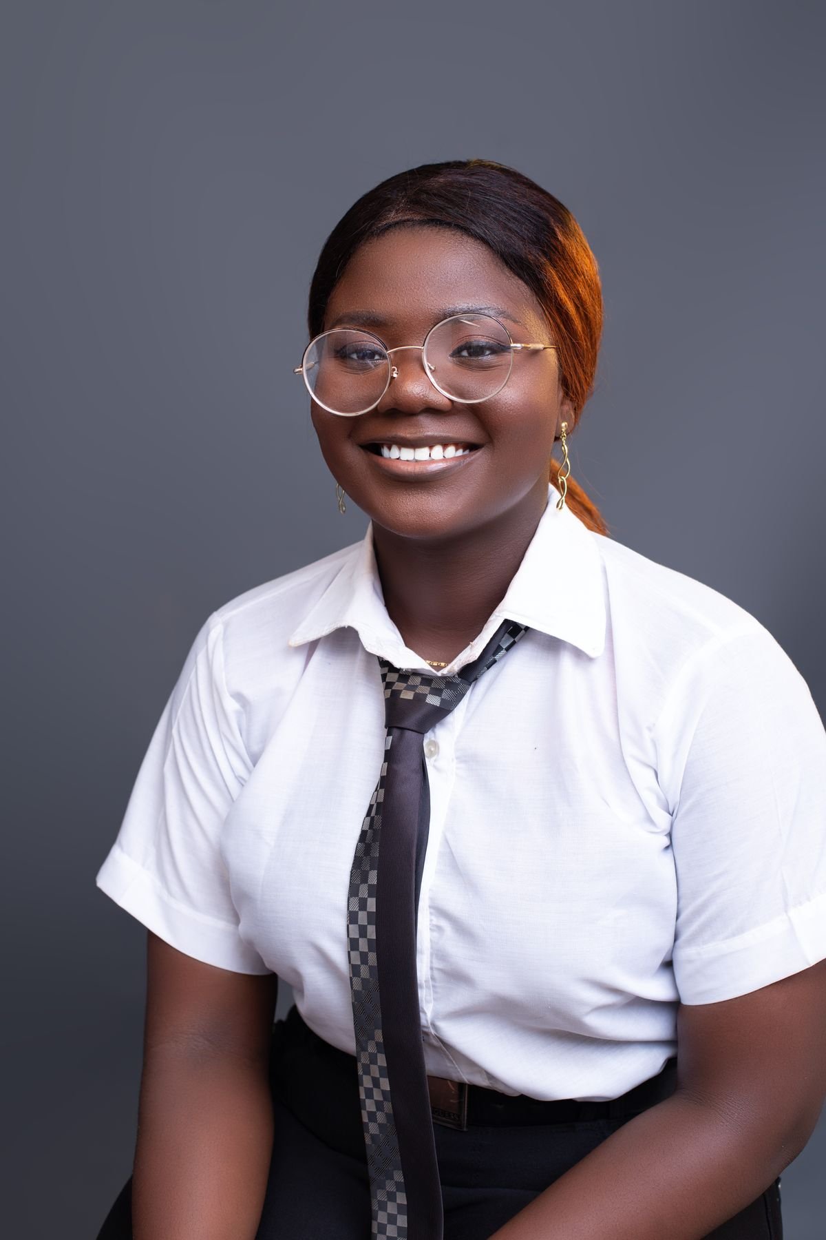 Confident young woman in professional office attire