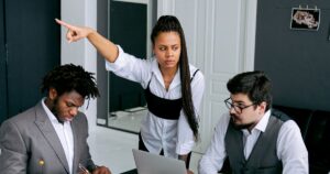 Tense meeting in an office representing a difficult manager situation at work