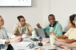 Candidates participating in a group discussion interview round